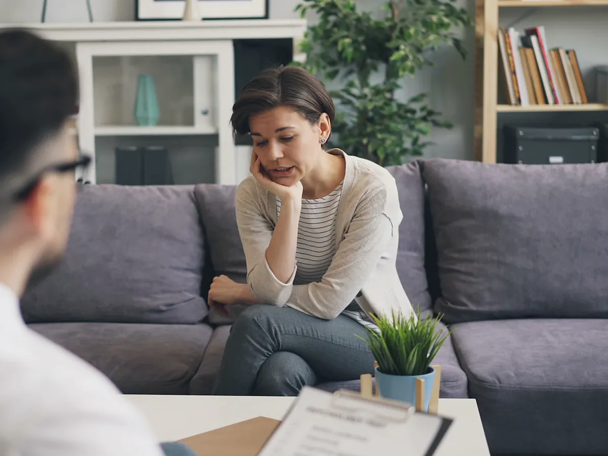 Patient talking with a provider in a calm office